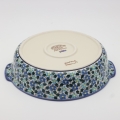 Okrągły półmisek ceramiczny z uszami z ceramiki bolesławieckiej – ręcznie zdobiony tradycyjnym wzorem. Idealny do serwowania mięs, sałatek i przekąsek. Stylowa i trwała polska ceramika.