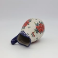 Autentyczna ceramika bolesławiecka – pojemny dzban ceramiczny z ergonomicznym uchwytem.