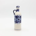 Ceramiczna butelka z korkiem Bolesławiec ręcznie malowana.
