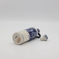 Ceramiczna butelka z korkiem Bolesławiec ręcznie malowana.