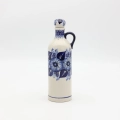 Ceramiczna butelka z korkiem Bolesławiec ręcznie malowana.