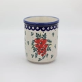 Duży ceramiczny pojemnik na przybory kuchenne z ręcznie malowanym motywem dekoracyjnym.
