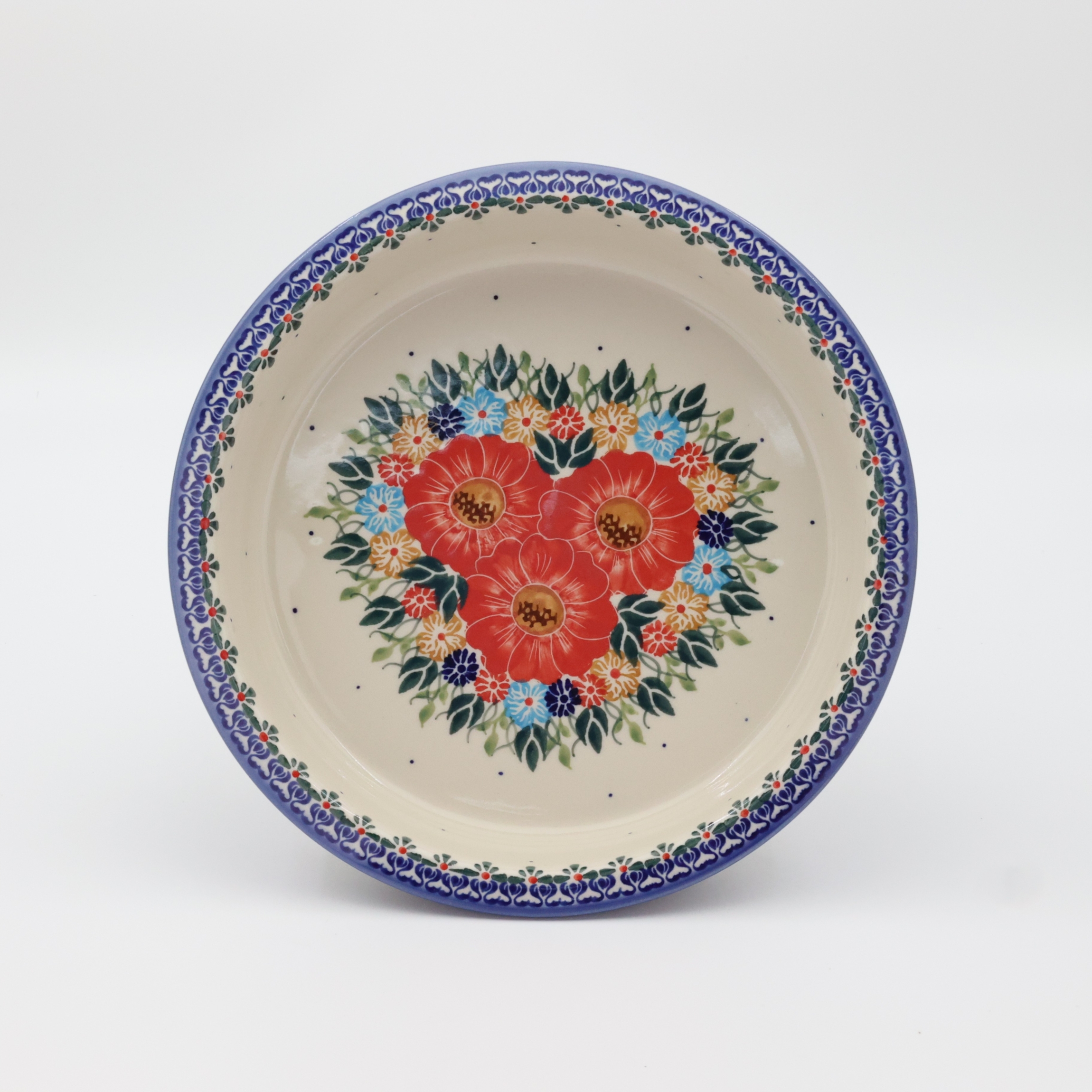 Okrągłe ceramiczne naczynie do zapiekania z Bolesławca, ręcznie zdobiona ceramika bolesławiecka, polskie rękodzieło artystyczne do piekarnika, mikrofalówki i zmywarki.