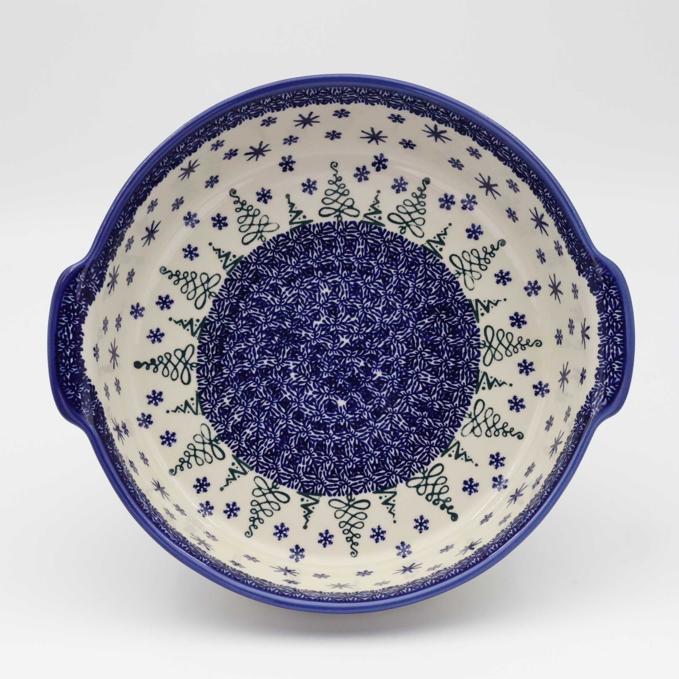 Okrągły półmisek ceramiczny z uszami z ceramiki bolesławieckiej – ręcznie zdobiony tradycyjnym wzorem. Idealny do serwowania mięs, sałatek i przekąsek. Stylowa i trwała polska ceramika.