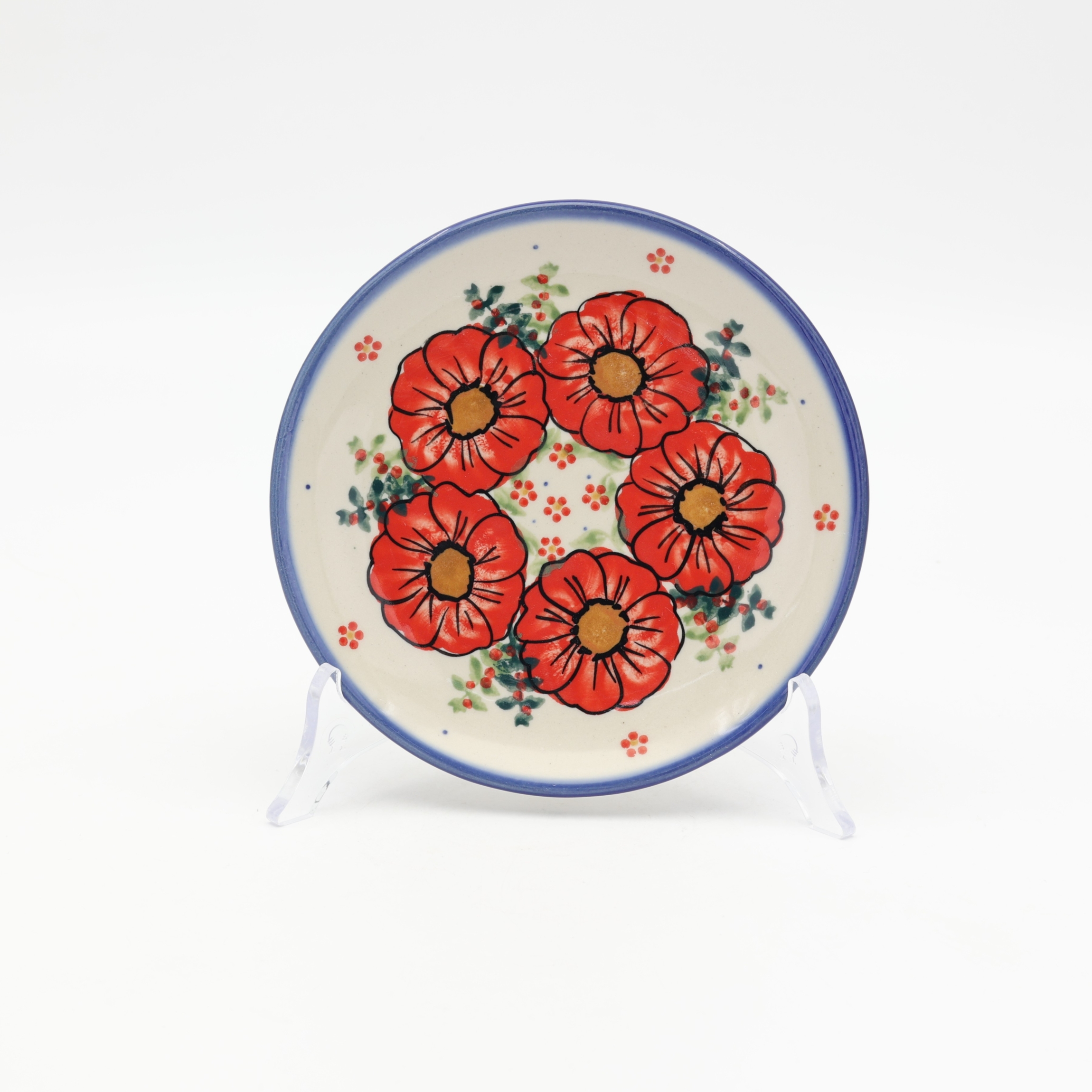 Ręcznie zdobiony mały talerz deserowy o średnicy 16 cm wykonany z tradycyjnej ceramiki bolesławieckiej. Idealny do serwowania ciast, deserów i przekąsek.