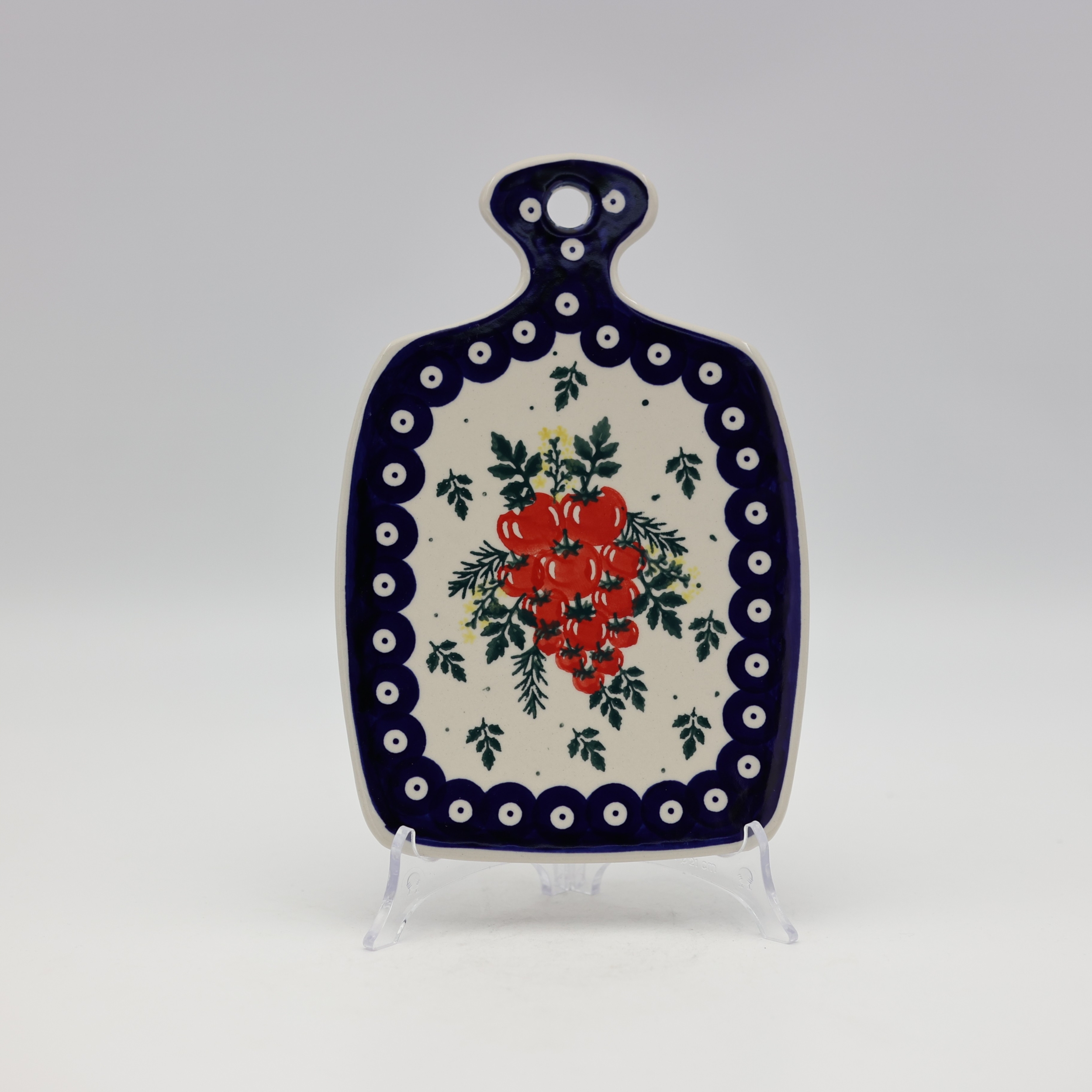 Ceramiczna deska do krojeni mała z wygodnym uchwytem, idealna na sery i przekąski.